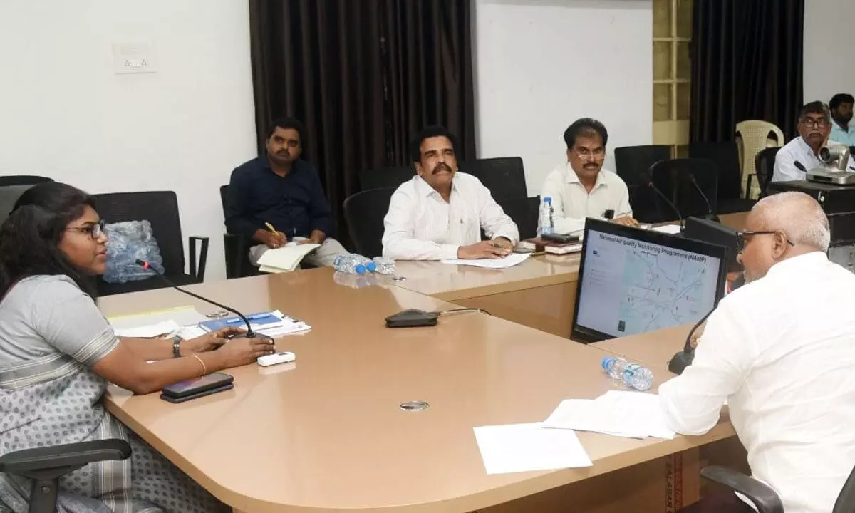 Collector K Vetri Selvi addressing a district-level committee to check air pollution in Eluru on Tuesday