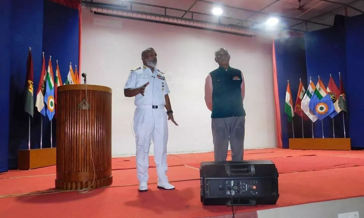 Commodore Ayyanar Muralidhar, Command Hydrographic Officer, Headquarters Eastern Naval Command giving a lecture on hydrography at Sainik School Korukonda