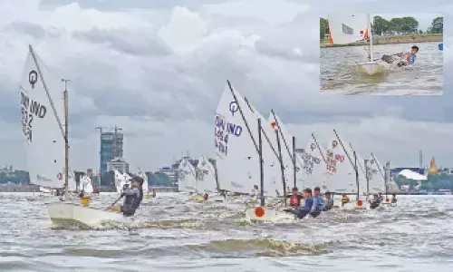 Shreya Krishna of Tamilnadu leading the fleet in the 9th race of the 15th Monsoon Regatta at Hussain Sagar Hyderabad. (Inset) Eklavya Batham of Madhya Pradesh in action during ILCA4 Boys event.