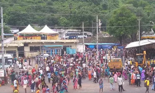 With weather being merciful, devotees trek, chanting Govinda, Govinda