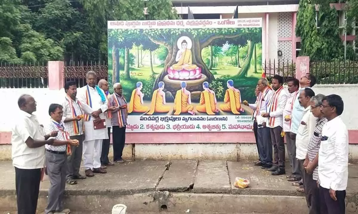 Buddha Dharma Prachara Kendram members celebrating Ashadha Guru Pournima at Collectorate in Ongole on Sunday