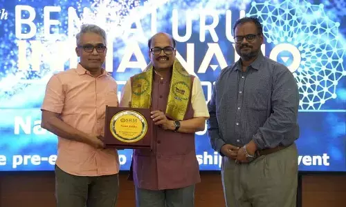 Prof CV Tomy felicitating Prof BLV Prasad,  eminent speaker at Nano Jatha