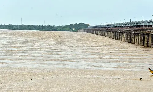 Floodwater being released from Dowleswaram Barrage into sea on Monday