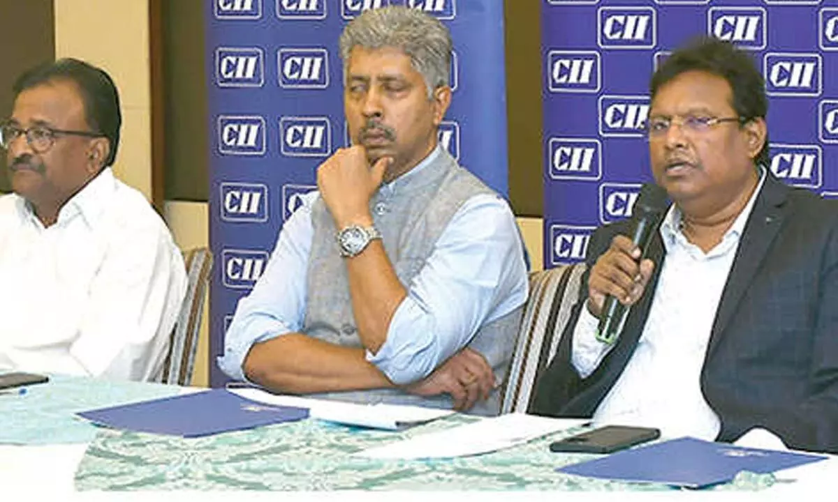 Confederation of Indian Industry Chairman V Murali Krishna and others addressing  a press conference in Vijayawada on Tuesday