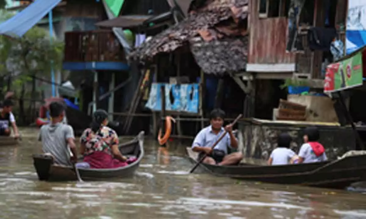 Schools shut as river overflows in Myanmars delta region