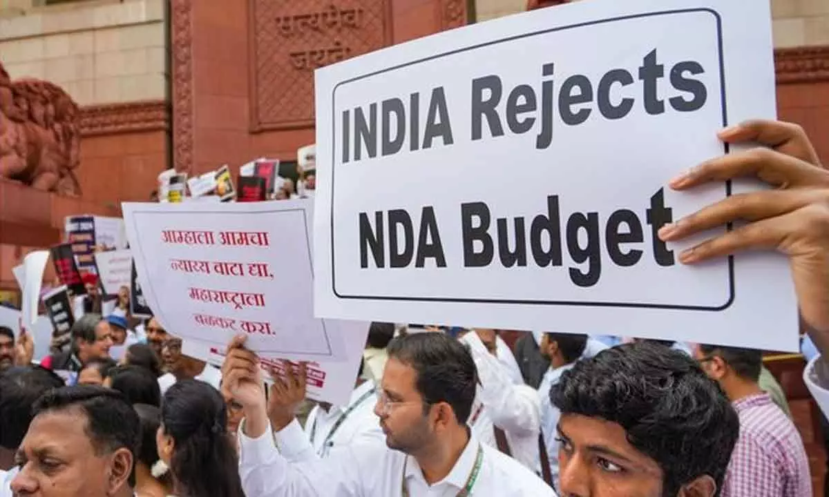 INDIA bloc MPs stage a protest at Parliament premises over alleged discrimination in the Union Budget 2024, during the Monsoon session in New Delhi on Wednesday