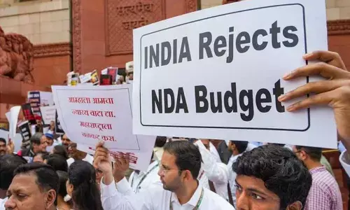 INDIA bloc MPs stage a protest at Parliament premises over alleged discrimination in the Union Budget 2024, during the Monsoon session in New Delhi on Wednesday