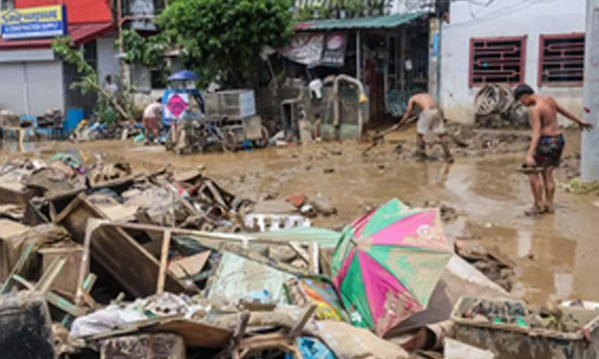 Death toll in Philippine typhoon, monsoon rises to 33