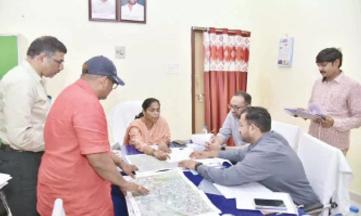 State Land Administration chief commissioner G Jayalakshmi along with Land Records, Survey and Settlements commissioner G Lathkar Shrikesh Balaji Rao visiting Phirangipuram Tahsildar’s office on Sunday