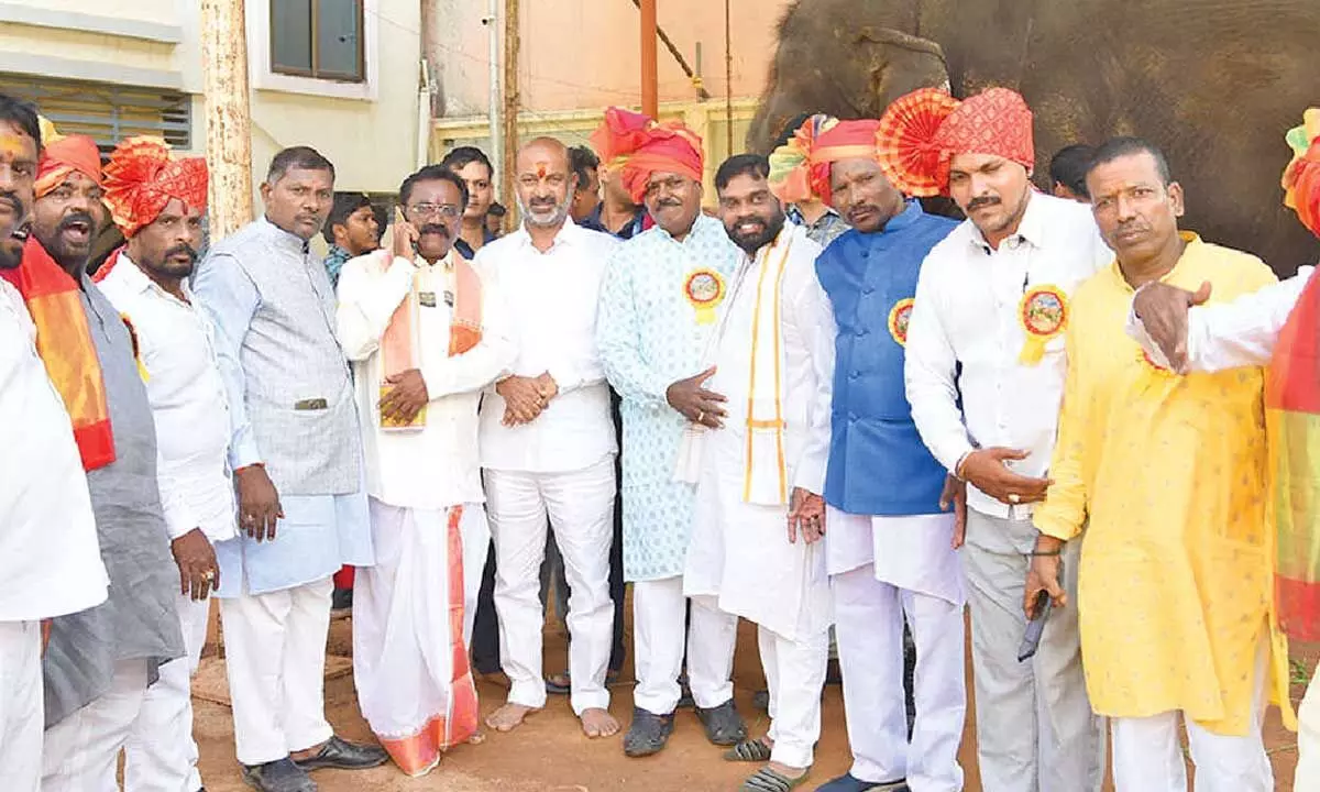 MoS (Home) Bandi Sanjay offers gold Bonam to deity