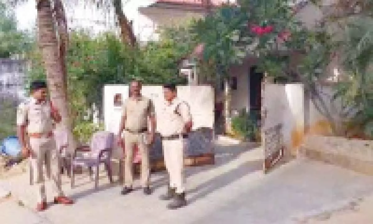 Police outside the residence of former Madanapalle MLA Nawaz Basha on Sunday