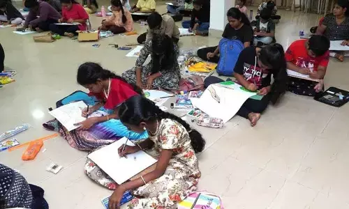 Students taking part in a drawing competition at IGZP in Visakhapatnam on Sunday