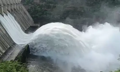 Srisailam dam authorities releasing water downstream after lifting three gates to a height of 10 feet on Monday