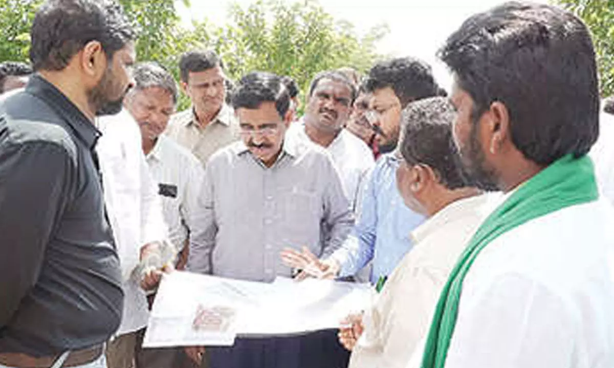 Minister for municipal administration and urban development P Narayana inspecting TIDCO houses in Amaravati on Monday