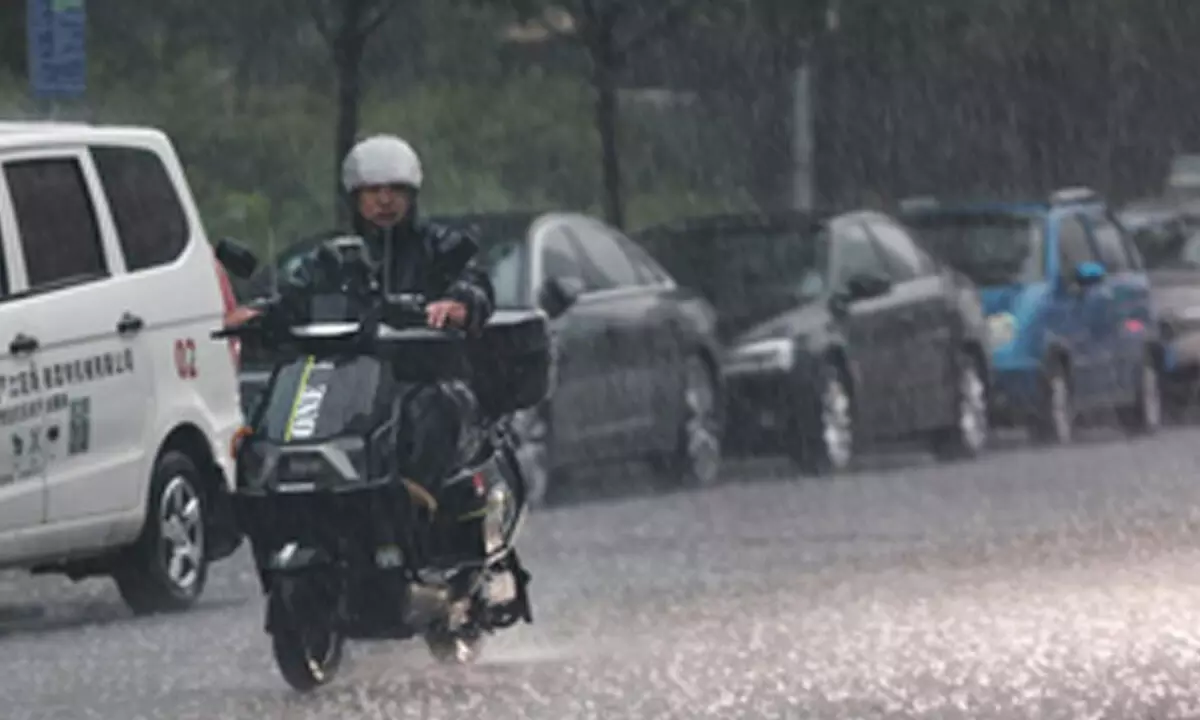 Beijing renews yellow alert for rainstorms