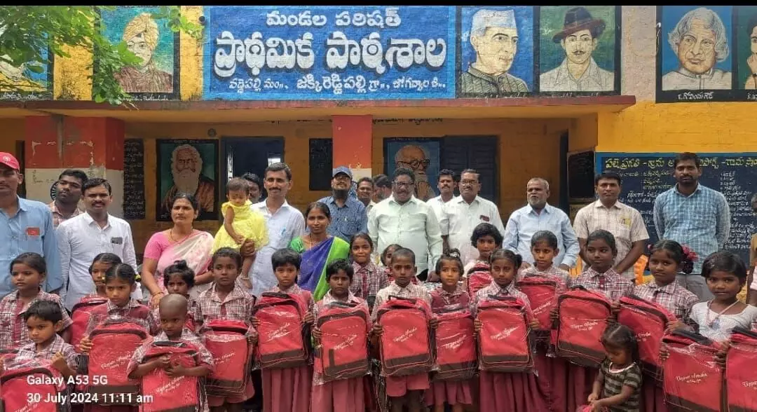 A Teacher Donated School Bags on his Daughter Srinitha s Bairth Day.