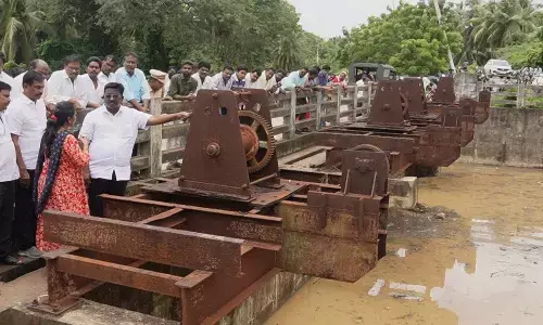 Amalapuram MLA Aithabathula Ananda Rao inspecting Gopailanka outfall sluice