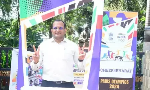 Visakhapatnam district collector M N Harendhira Prasad at the selfie point in Visakhapatnam on Monday