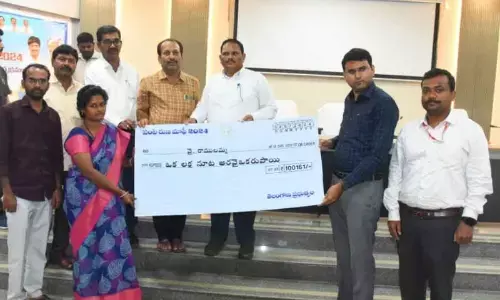 Release of Funds for the Second Phase of Farmer Loan Waiver Amidst Festive Atmosphere.