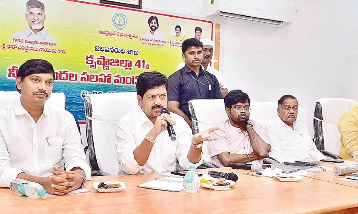 Minister Kollu Ravindra addressing Krishna district irrigation advisory board meeting in Machilipatnam on Tuesday