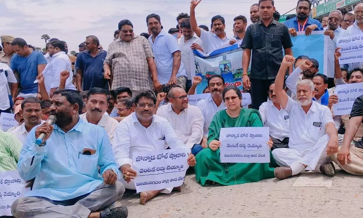 MLA PAditi Gajapathi, MLCs PRaghu Varma, PSuresh Babu and others take part in dharna against toll plaza at Jonnada on Tuesday