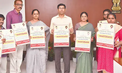 District Collector Dr S Venkateswar along with district and divisional panchayat officers Susila Devi and Rupa Rani releasing call centre posters in Tirupati on Tuesday