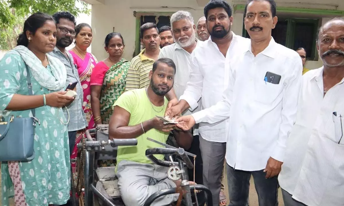 TDP leader N Sambasiva Rao and ward secretariat staff distributing pensions in the Central constituency in Vijayawada on Thursday