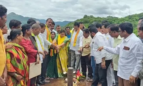 Minister GSandhya Rani releasing water from Peddagedda reservoir