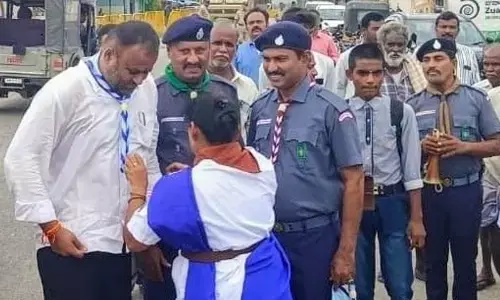 Minister for Transport and Sports Mandipalli Ramprasad Reddy participating in World Scout Day programme at Sambepalli mandal centre on Thursday