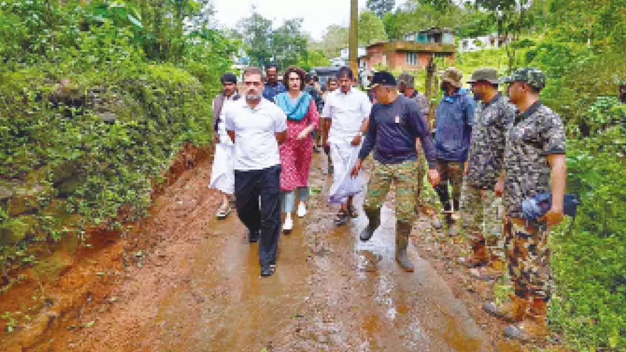 Leader of Opposition in the Lok Sabha Rahul Gandhi with AICC general secretary Priyanka Gandhi Vadra and party leader KC Venugopal visits a landslide-hit area, in Wayanad district on Friday