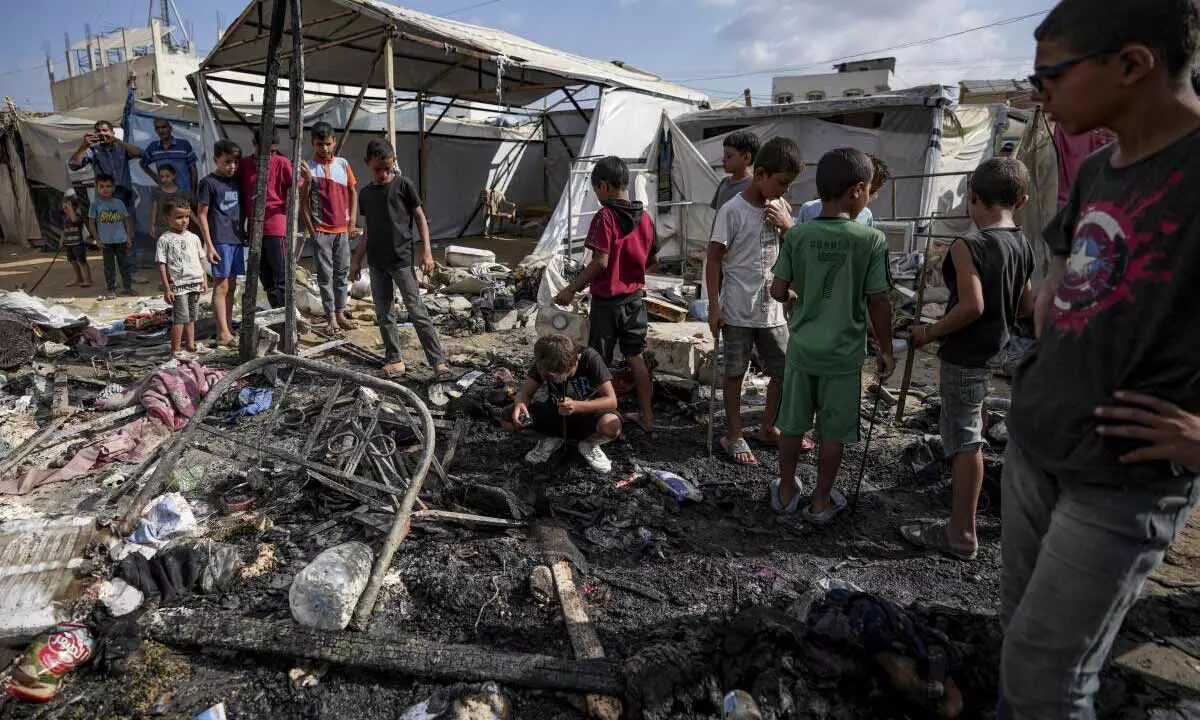 Israeli strikes on Gaza kill 18; stabbing in Tel Aviv kills two