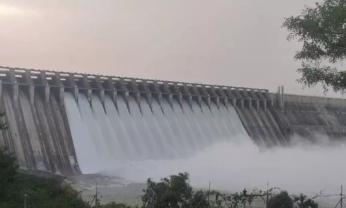 Floodwater gushing out from Nagarjuna Sagar reservoir in Guntur district on Monday