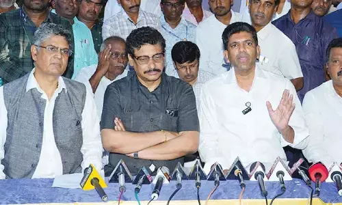 Union Minister of State for Communications Dr Pemmasani Chandrasekhar addressing a meeting at Tadikonda BSNL 4G Tower on Sunday. BSNL CMD Robert J Ravi is also seen
