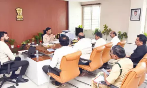 District Collector Dr S Venkateswar reviewing the Pulicat Lake desilting project with officials in Tirupati on Saturday
