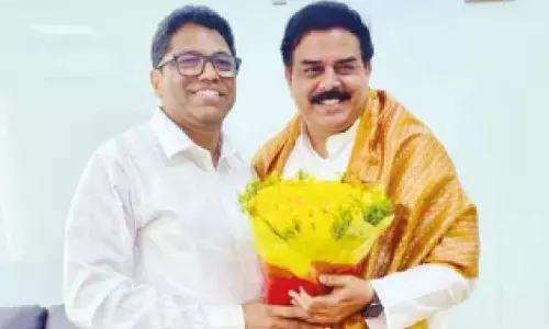 Sri City MD Ravindra Sannareddy with Minister for Civil Supplies Nadendla Manohar