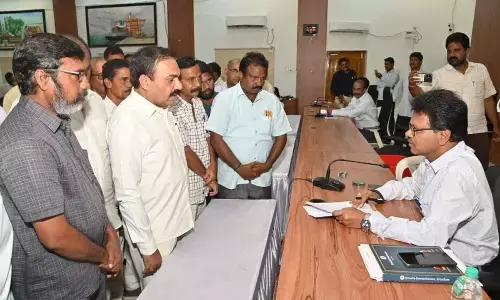 Former Minister Kakani Govardhan Reddy submitting a memorandum to DRO Lavanna at the Collectorate in Nellore on Monday