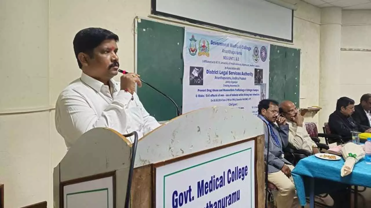 DLSA secretary G Shiva Prasad Yadav speaking at an awareness programme at AMC in Anantapur on Thursday