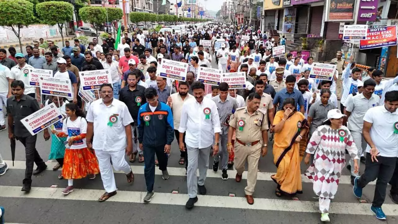 Awareness Walk Against Cyber Crimes Held in Vijayawada, Home Minister participates