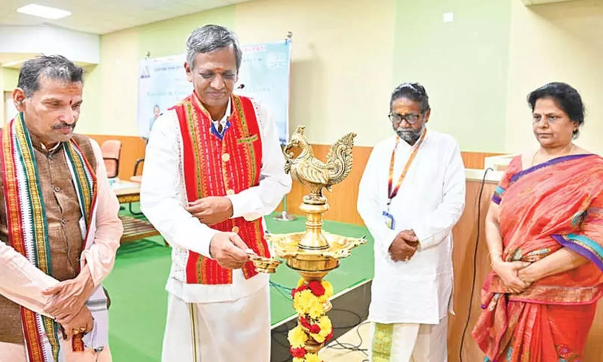 Executive Director of C-DAC, Dr SD Sudarsan, inaugurating the national seminar by lighting the lamp at NSU, Tirupati on Sunday. NSU V-C Prof GSR Krishna Murthy, Registrar Prof RJ Ramasree and Prof K Ganapathi Bhatt are also seen.