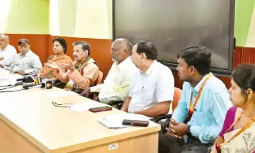 NSU Vice-Chancellor Prof GSR Krishna Murthy addressing the media in Tirupati on Tuesday. Registrar Prof RJ Ramasree and Deans are also seen.