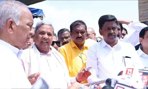 Karnataka Chief Minister Siddaramaiah along with AP Ministers Nimmala Ramanaidu and  Payyavula Keshav at the TB dam in Hosepet on Tuesday