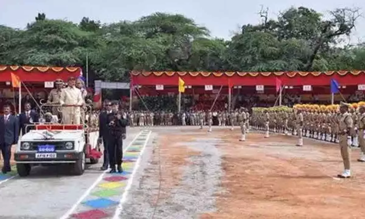 AP CM Chandrababu hoists national flag at Indira Gandhi Stadium in Vijayawada