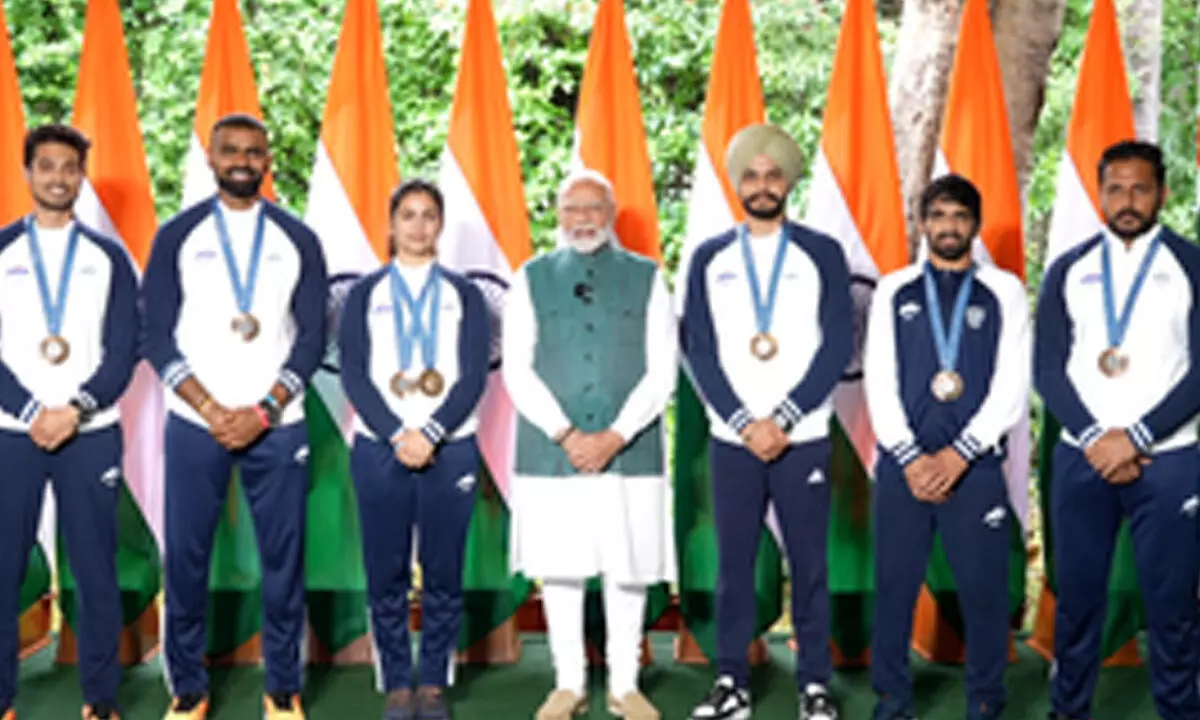 PM Modi meets Indias Paris Olympic contingent at his residence