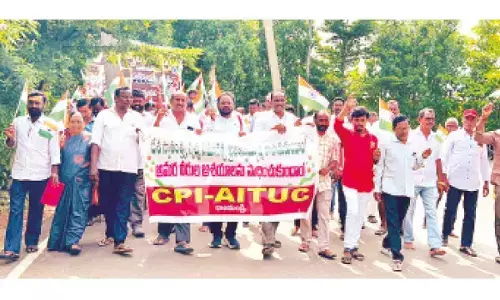 CPI and AITUC leaders taking out rally in Rajamahendravaram on Thursday