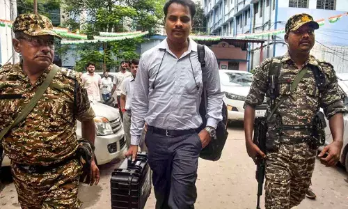 A CBI official arrives during investigation of the alleged rape and murder of a woman doctor, at R G Kar Medical College and Hospital in Kolkata on Friday
