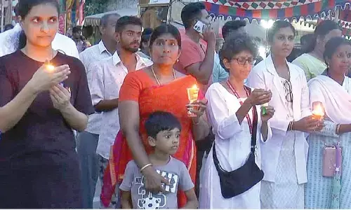 Doctors and medicos taking out a rally with candles in Mangalagiri on Sunday