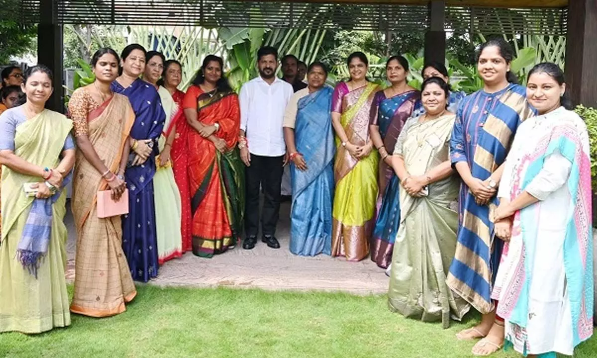 Women Leaders Tie Rakhi to CM Revanth Reddy