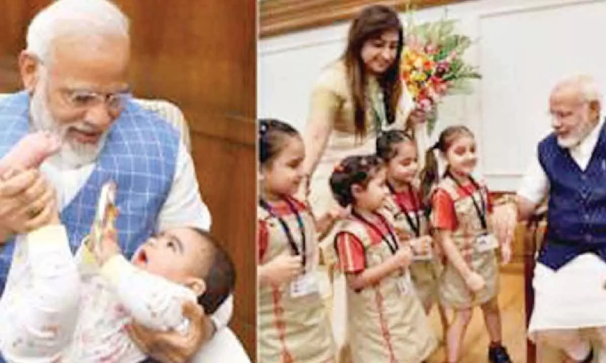 Children share heart-warming moment with PM Modi