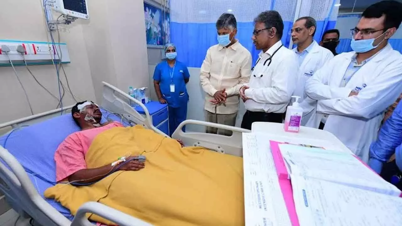 Chief Minister N Chandrababu Naidu interacting with reactor blast victims in Visakhapatnam on Thursday