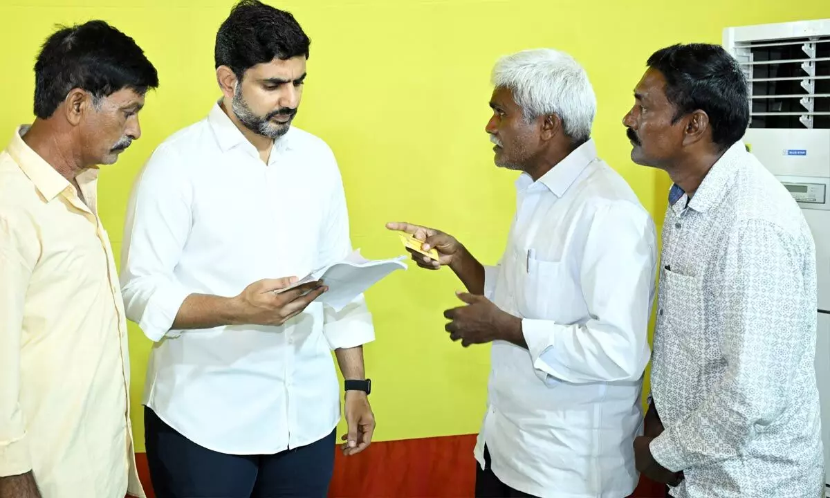 Nara Lokesh receiving petitions from people at Praja Darbar at his residence in Undavalli on Friday